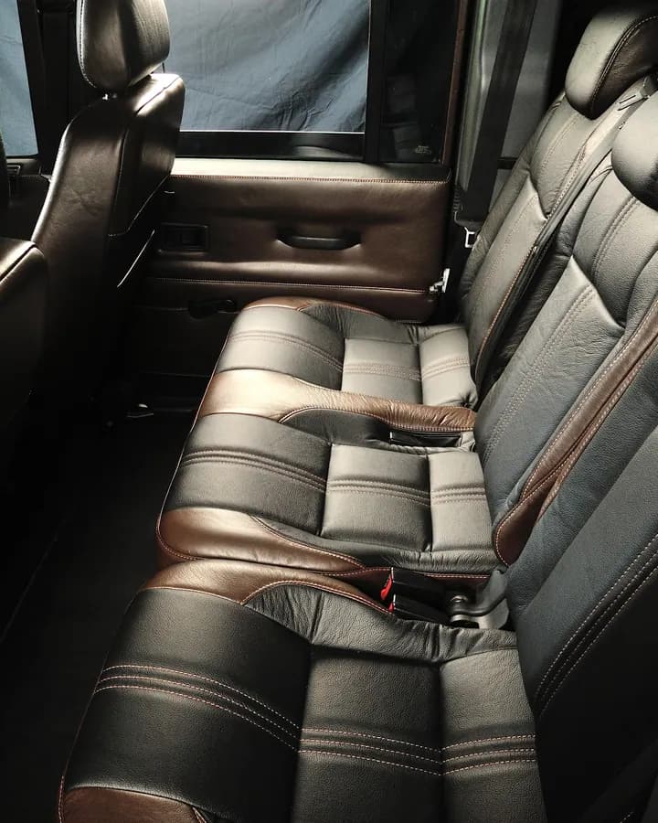Brown And Black Defender With Door Cards