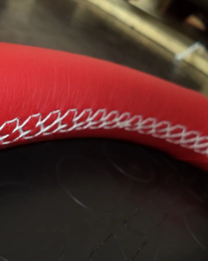 Defender Steering Wheel Close Up Red Leather With White Stitch